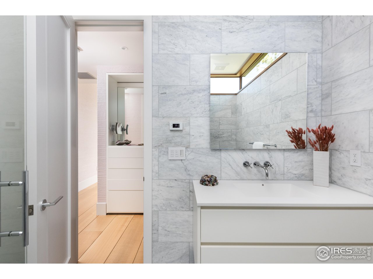 1505 Sunset Boulevard Boulder, CO 80304 - Photo 20 of 40 a bathroom with a sink and a mirror