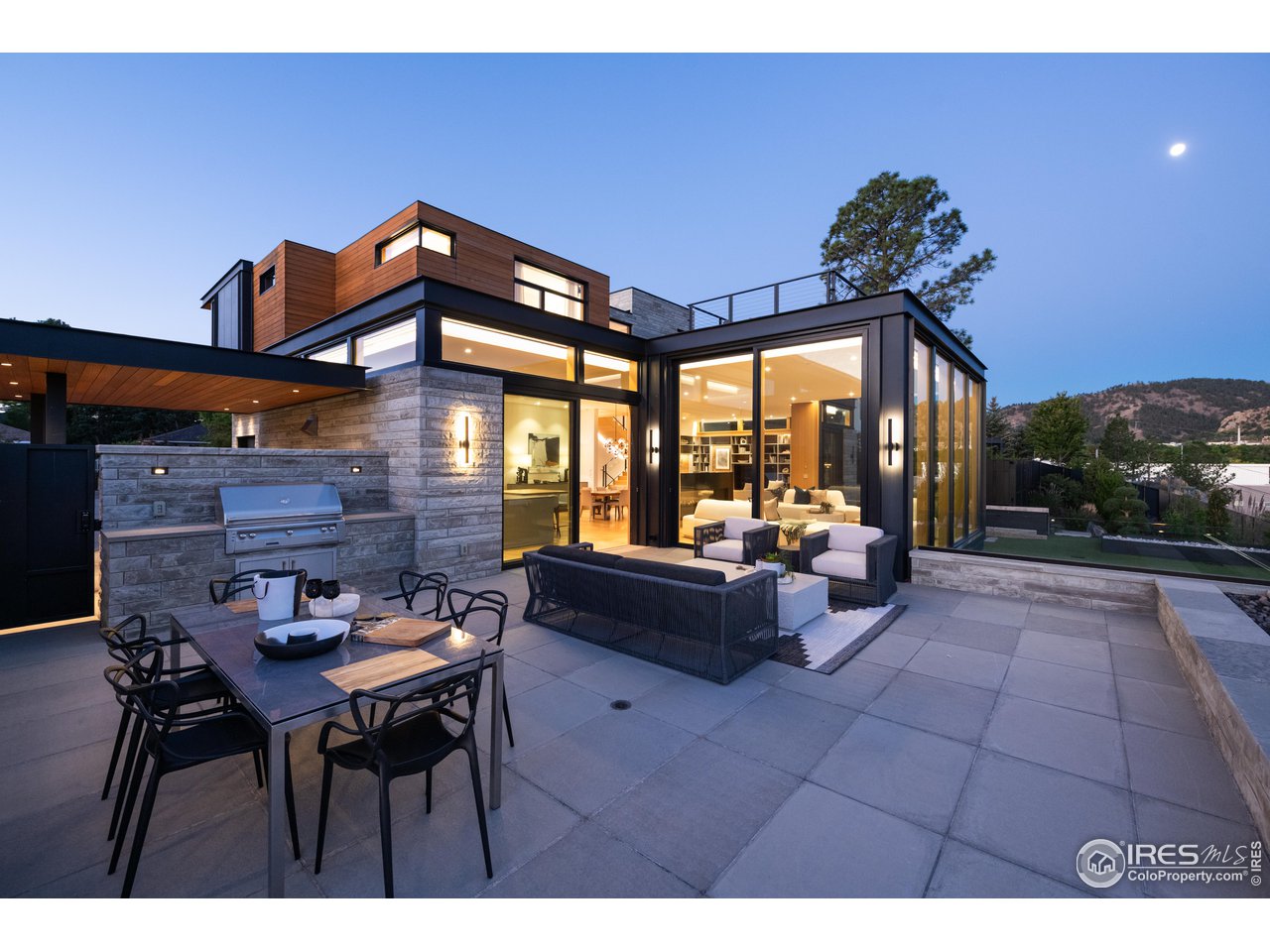 1505 Sunset Boulevard Boulder, CO 80304 - Photo 34 of 40 a view of a porch with furniture and a yard