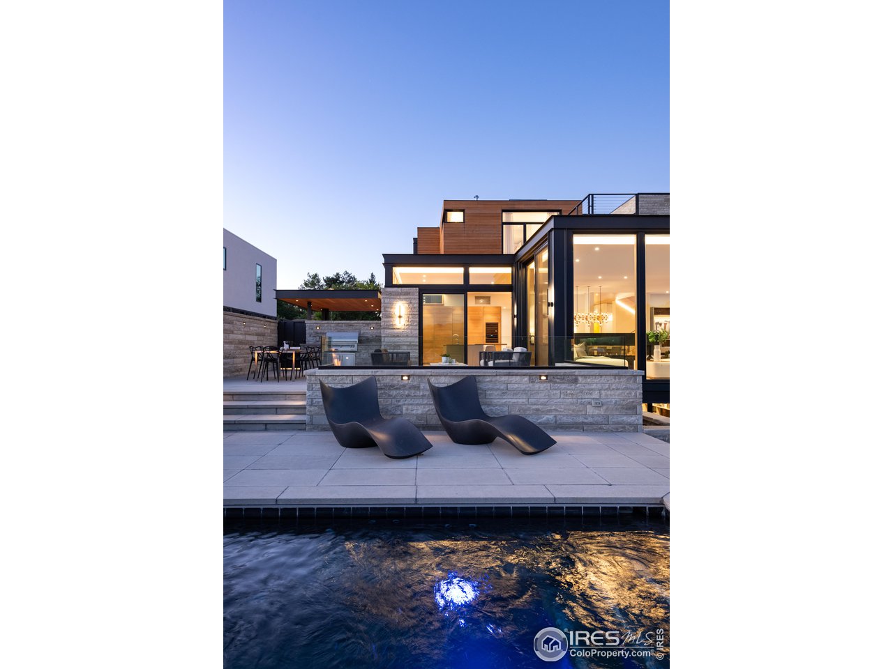 1505 Sunset Boulevard Boulder, CO 80304 - Photo 35 of 40 a living room with furniture and a floor to ceiling window