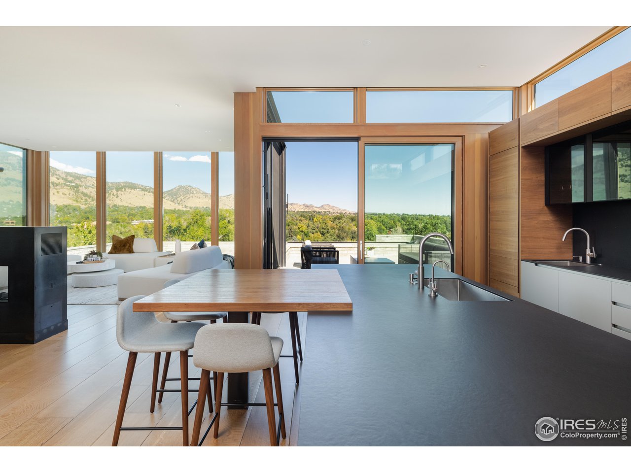 1505 Sunset Boulevard Boulder, CO 80304 - Photo 5 of 40 a dining room with furniture and large windows