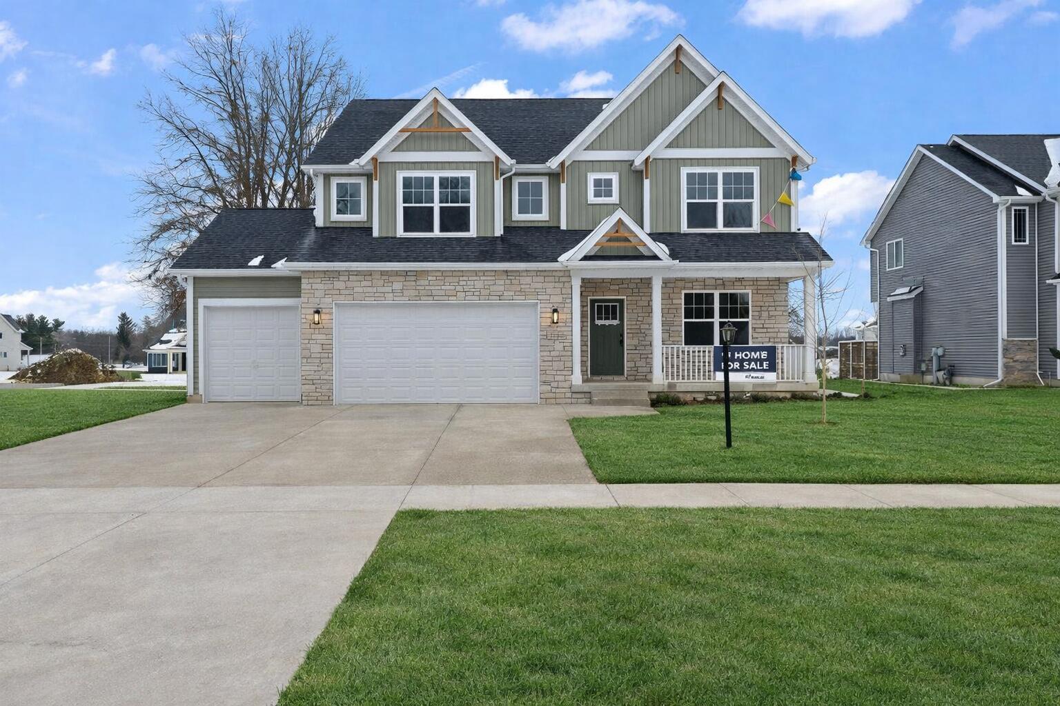 2132 Pradera Trail Chesterton, IN 46304 - Photo 1 of 46 a front view of a house with a yard