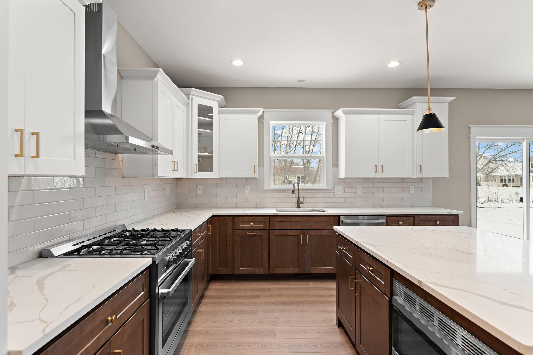 2132 Pradera Trail Chesterton, IN 46304 - Photo 19 of 46 a kitchen with stainless steel appliances a sink stove and cabinets