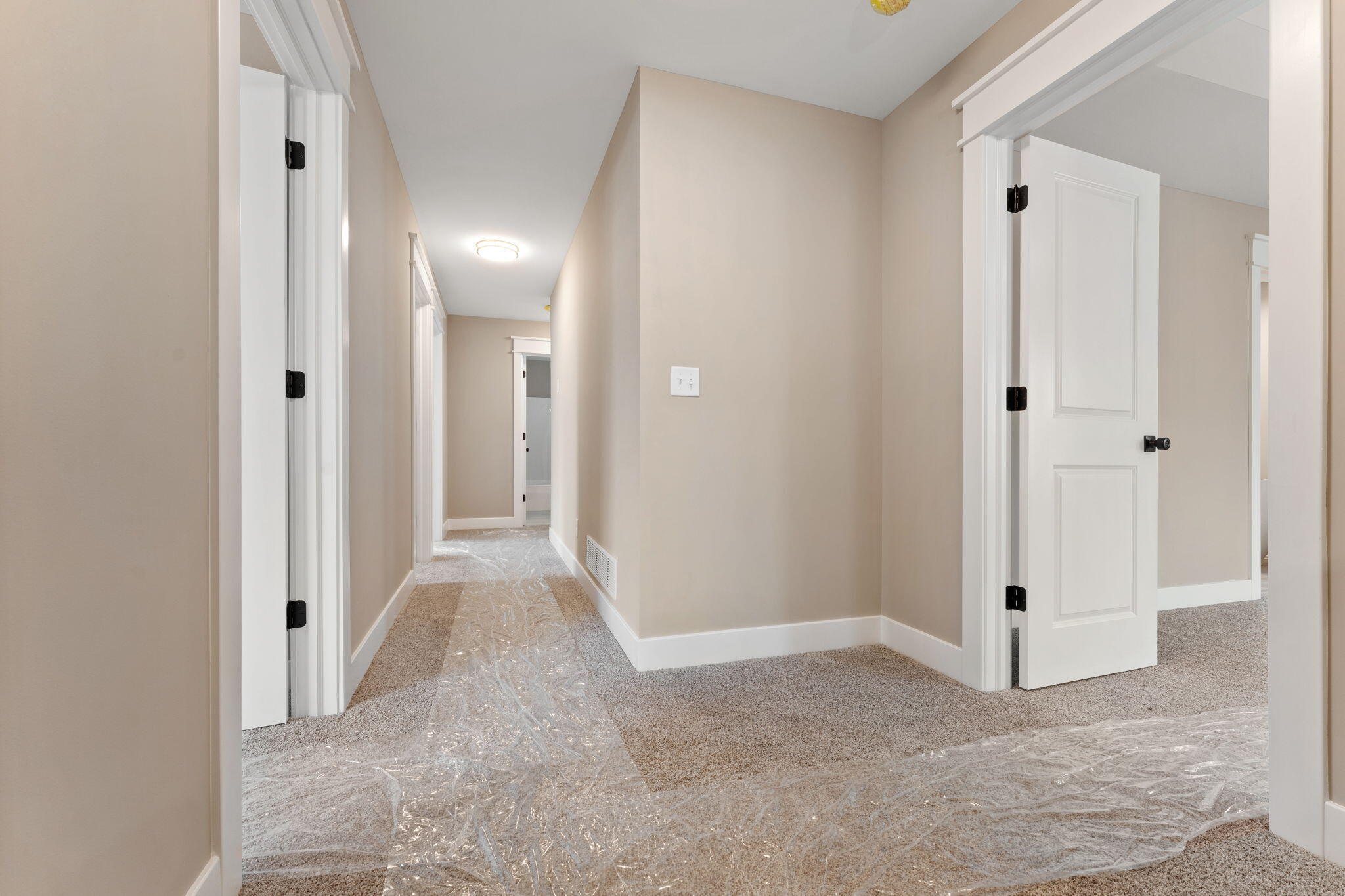 2132 Pradera Trail Chesterton, IN 46304 - Photo 29 of 46 a view of a hallway with wooden floor