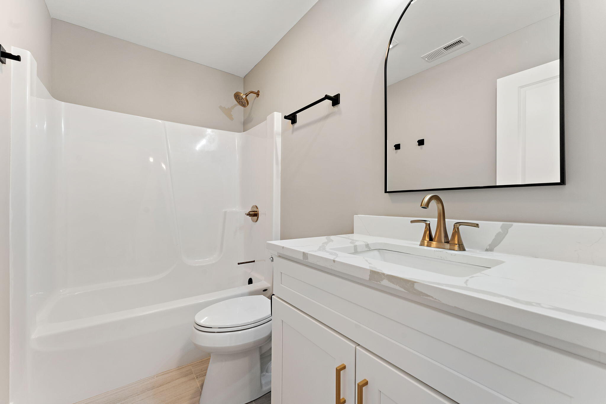2132 Pradera Trail Chesterton, IN 46304 - Photo 33 of 46 a bathroom with a sink a toilet and shower