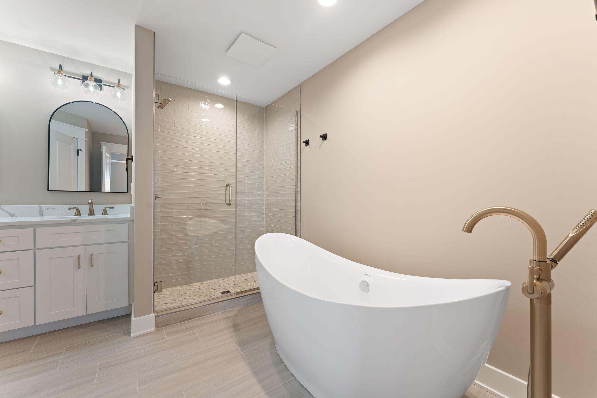 2132 Pradera Trail Chesterton, IN 46304 - Photo 37 of 45 a bathroom with a bathtub sink and mirror