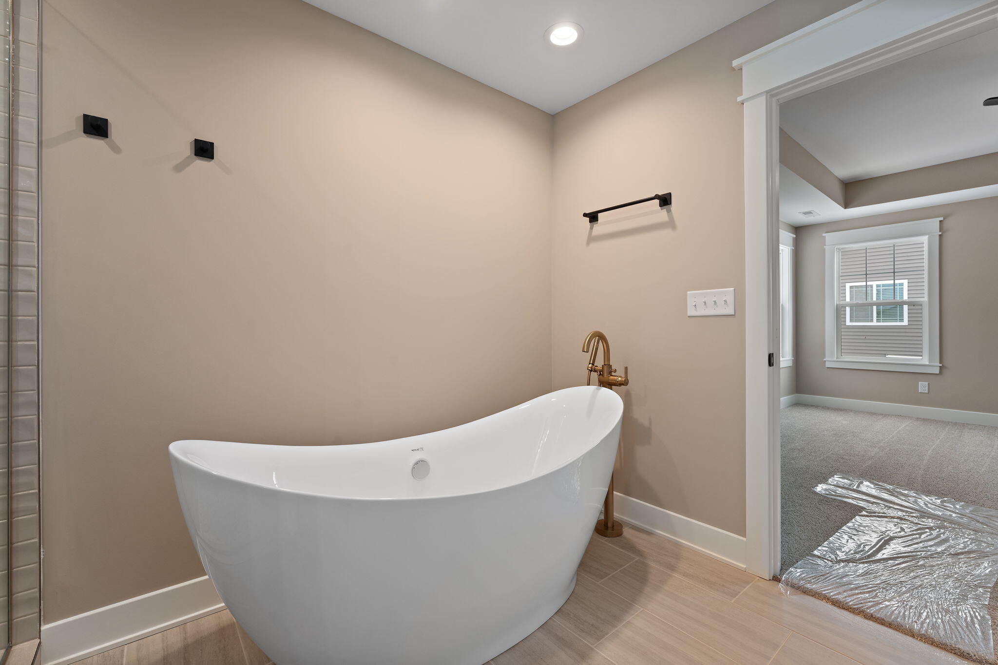 2132 Pradera Trail Chesterton, IN 46304 - Photo 39 of 46 a white bath tub sitting in a bathroom