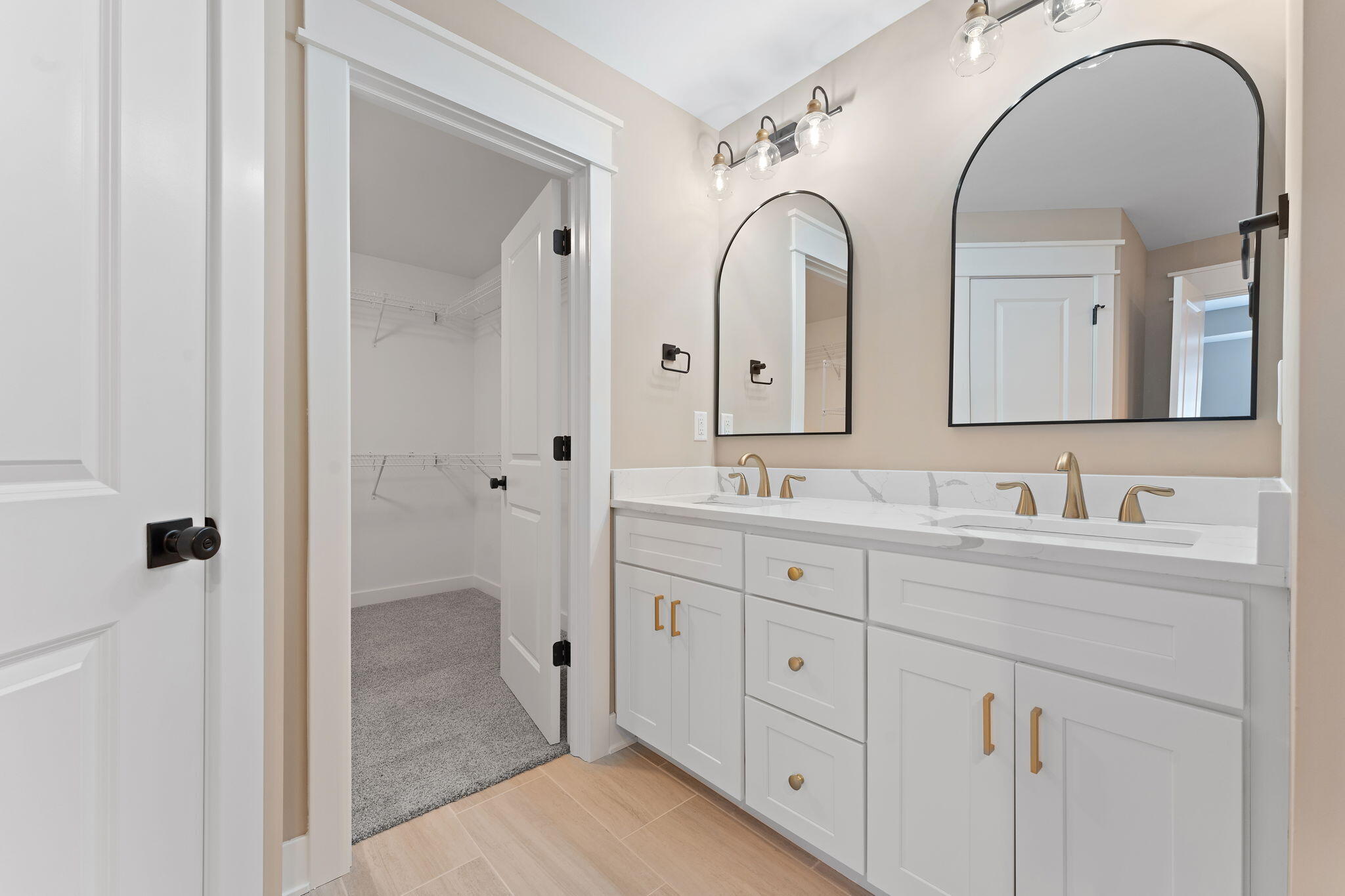 2132 Pradera Trail Chesterton, IN 46304 - Photo 39 of 45 a spacious bathroom with a granite countertop sink mirror and