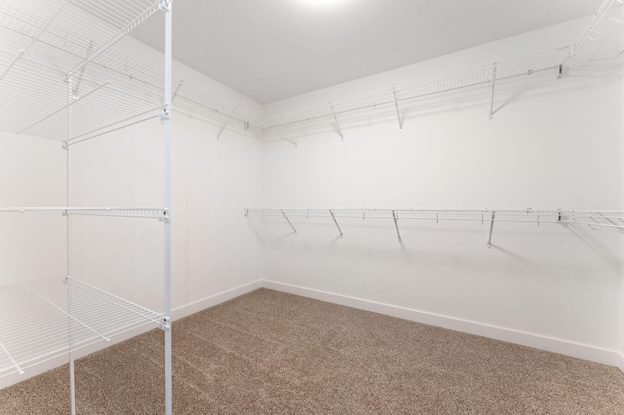 2132 Pradera Trail Chesterton, IN 46304 - Photo 42 of 46 a view of a room and racks on the wall