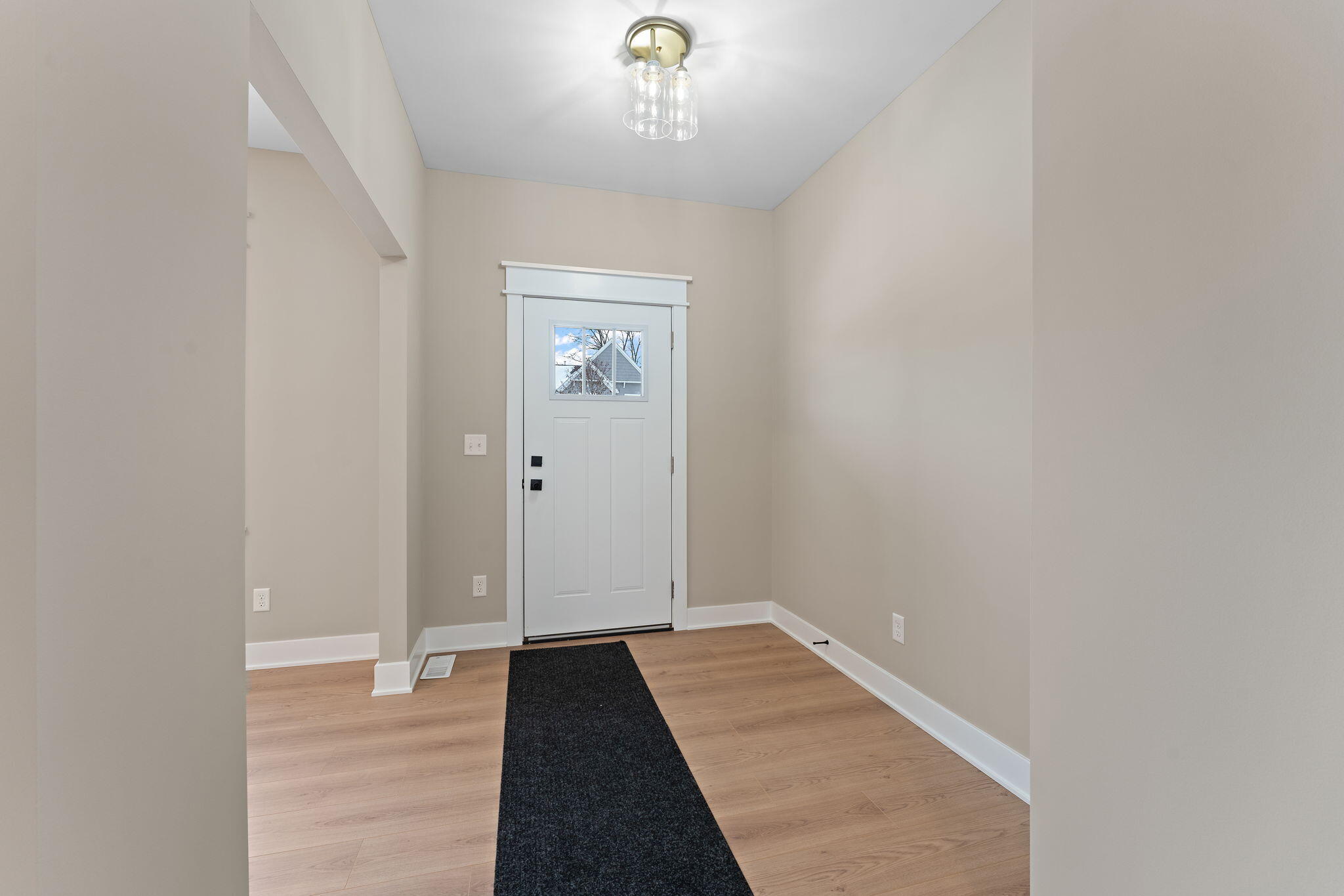 2132 Pradera Trail Chesterton, IN 46304 - Photo 5 of 45 a view of a hallway view with staircase