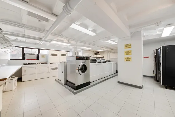 a utility room with washer and dryer