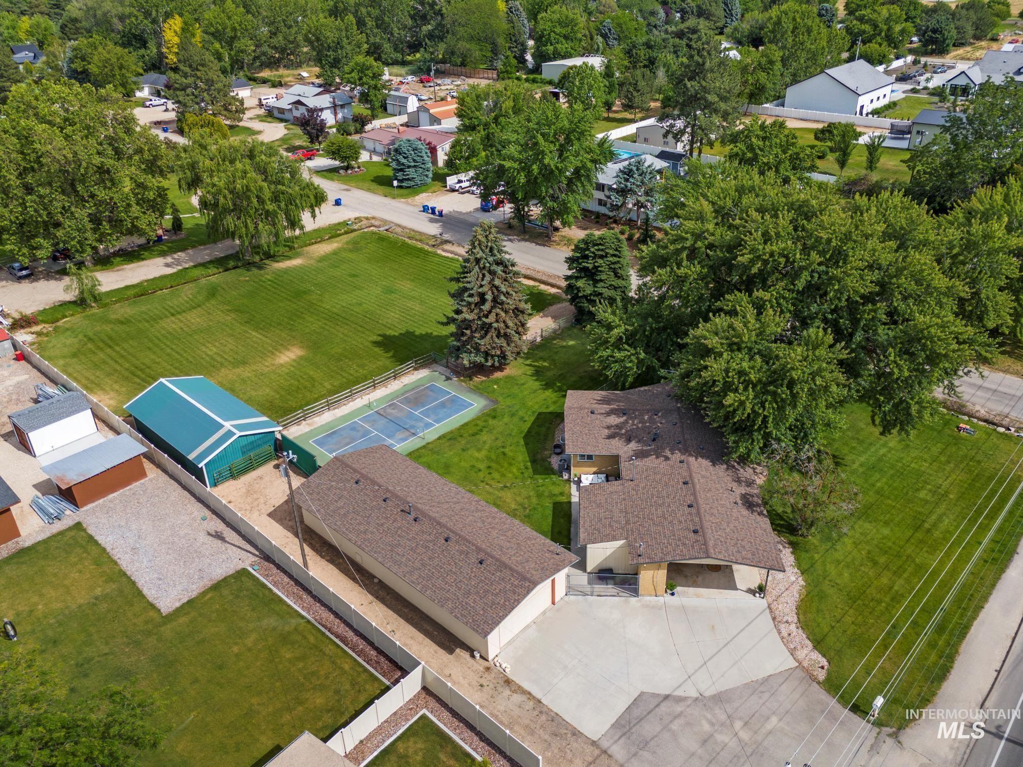4320 North Locust Grove Road Meridian, ID 83646 - Photo 1 of 1 Aerial perspective of suburban area