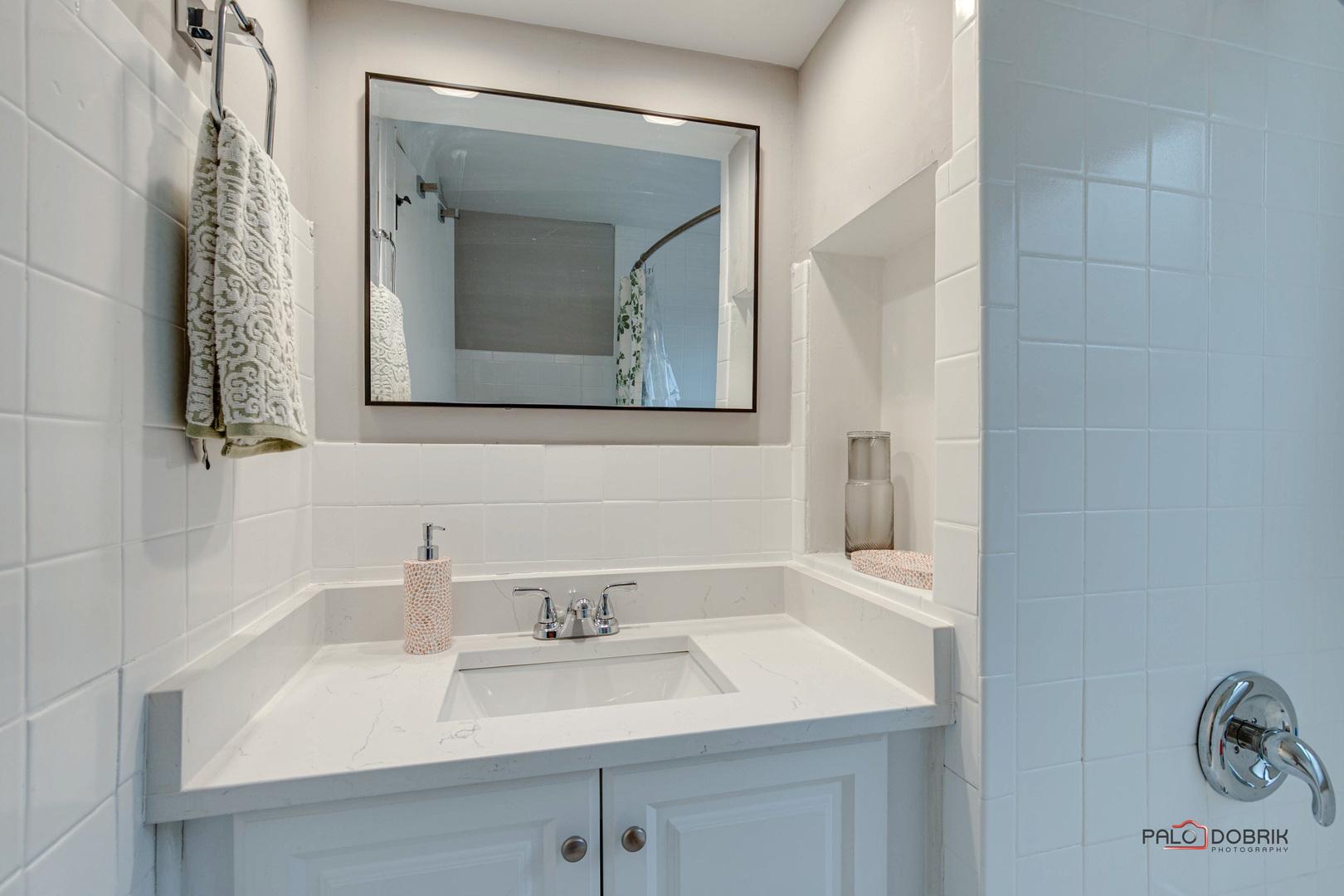 706 Deerpath Drive Deerfield, IL 60015 - Photo 14 of 36 a bathroom with a sink and a mirror