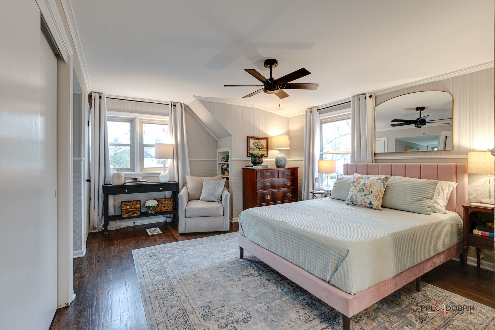 706 Deerpath Drive Deerfield, IL 60015 - Photo 15 of 36 a bedroom with a bed and a large mirror