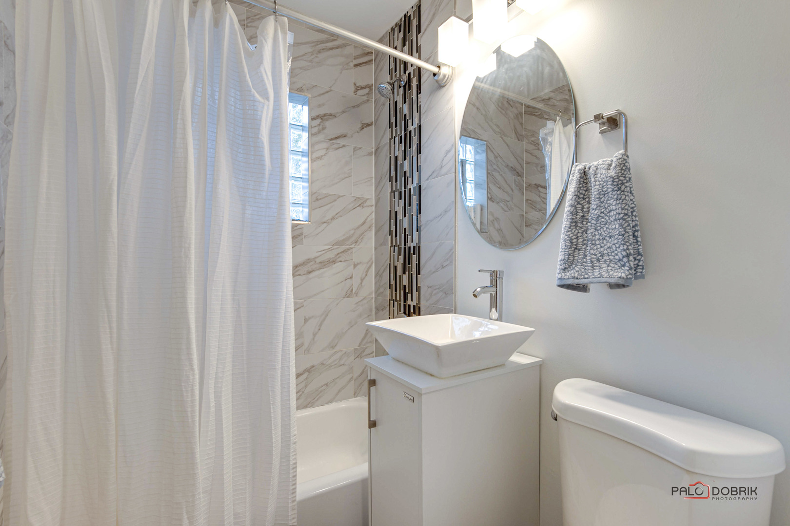 706 Deerpath Drive Deerfield, IL 60015 - Photo 20 of 36 a bathroom with a sink toilet and shower