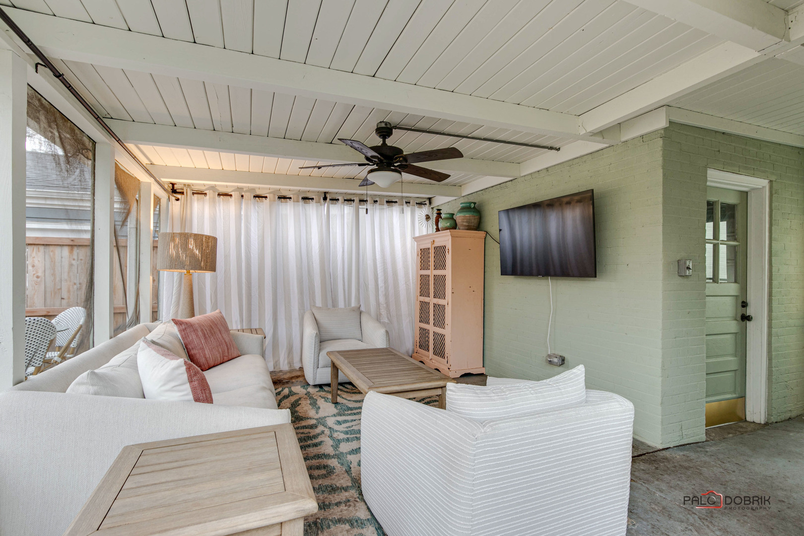 706 Deerpath Drive Deerfield, IL 60015 - Photo 24 of 36 a living room with furniture and a flat screen tv