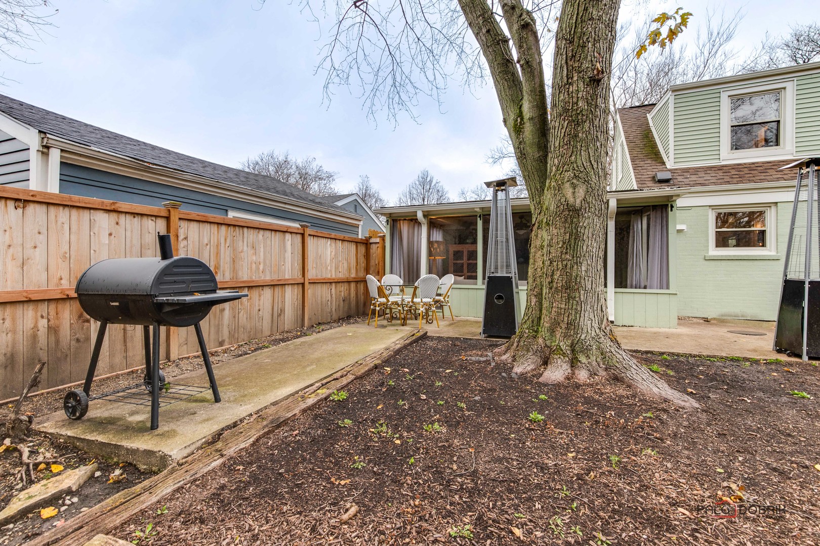 706 Deerpath Drive Deerfield, IL 60015 - Photo 28 of 36 a view of a backyard with a large tree