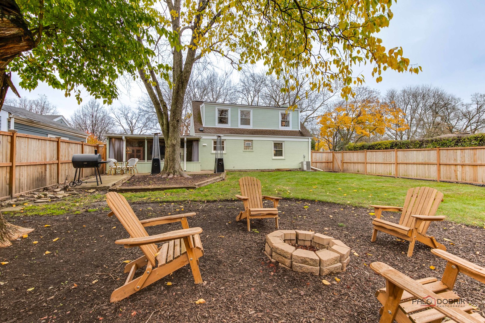 706 Deerpath Drive Deerfield, IL 60015 - Photo 29 of 36 a view of backyard with seating area and trees