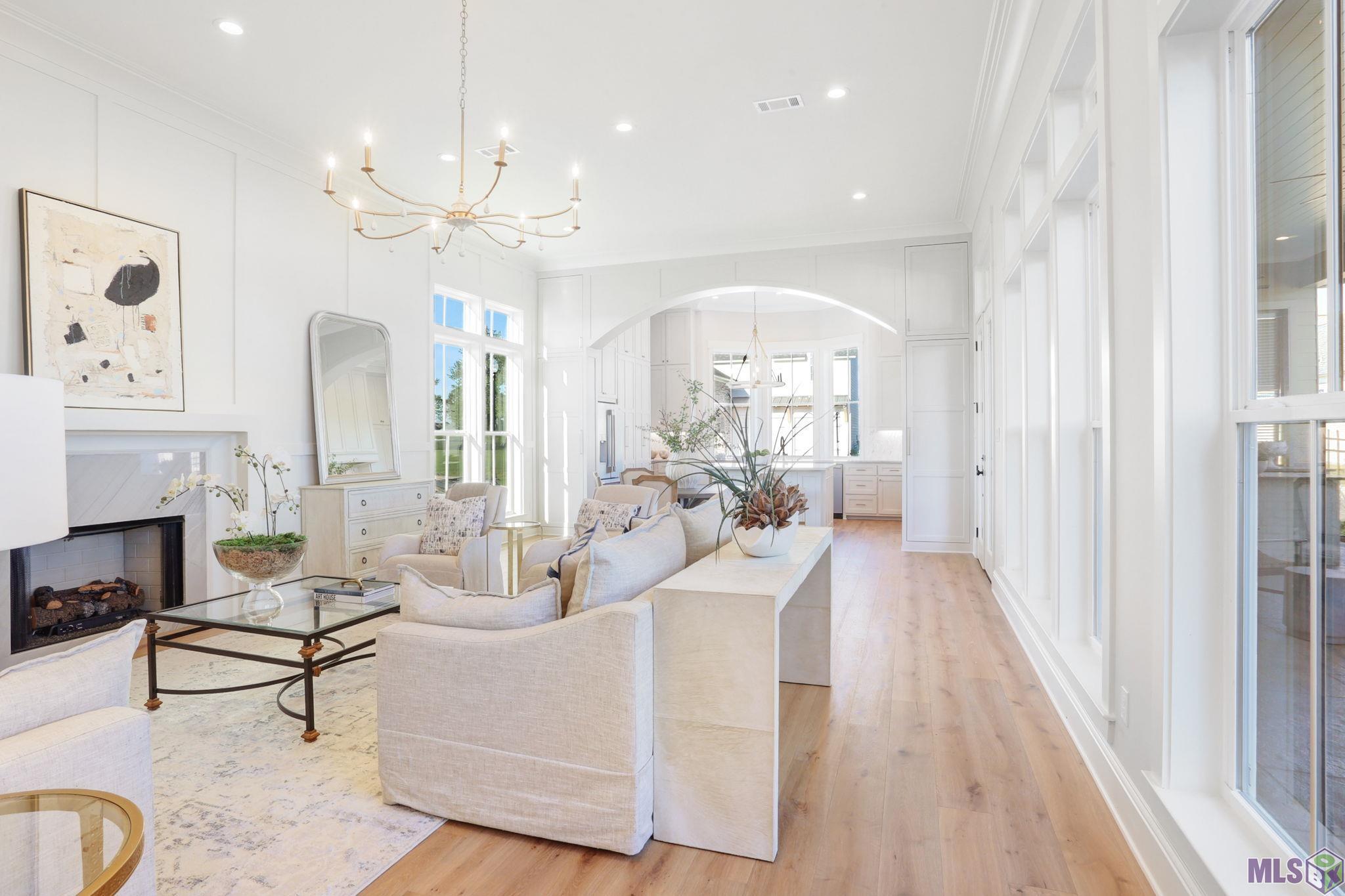 13807 Harveston Mill Drive Baton Rouge, LA 70810 - Photo 12 of 42 Looking from the back of the living room through to the kitchen