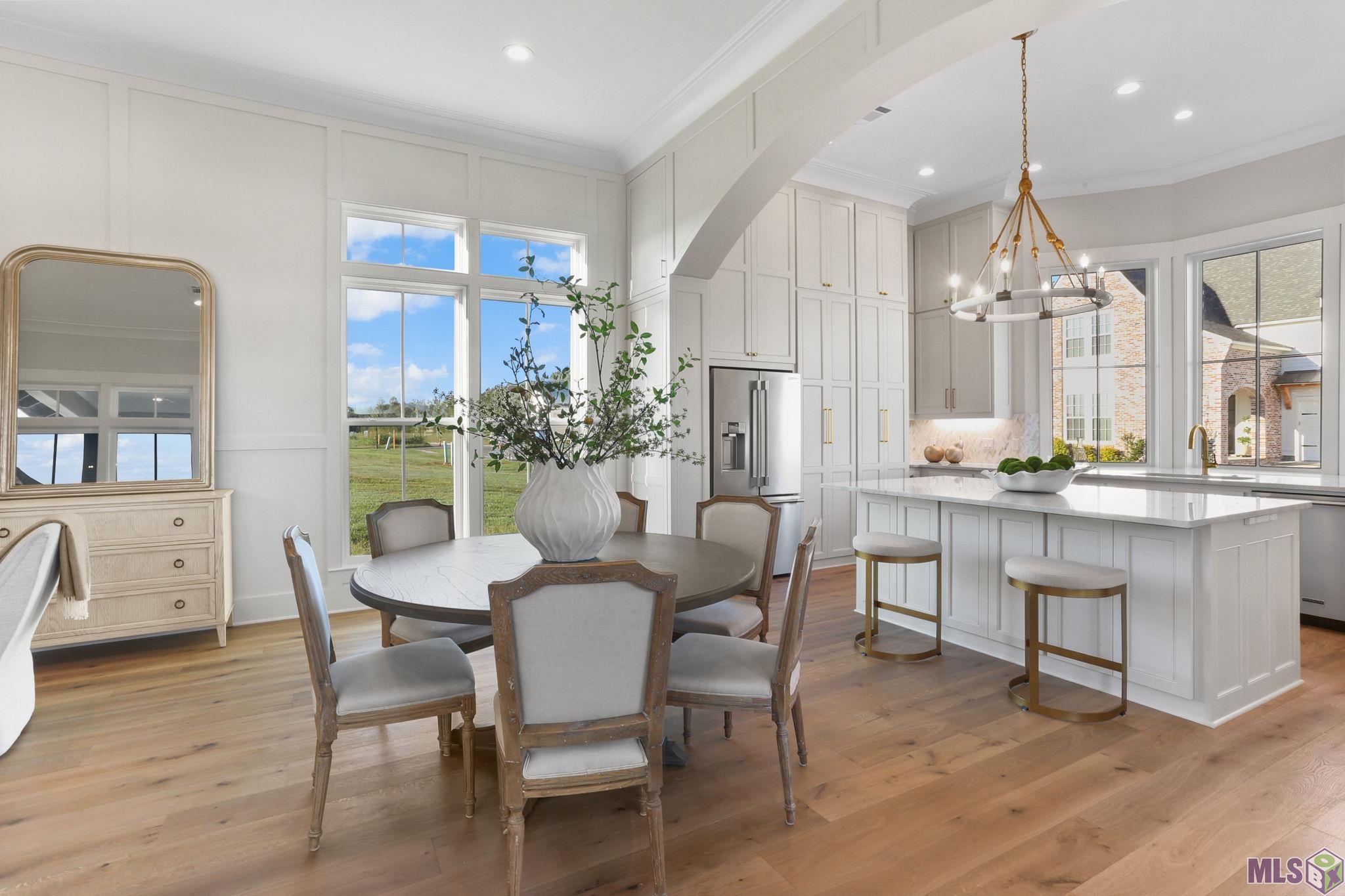 13807 Harveston Mill Drive Baton Rouge, LA 70810 - Photo 6 of 42 A closer view of the dining and kitchen