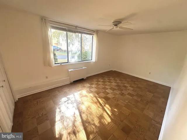 a view of an empty room and window