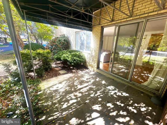 a view of a yard with an outdoor space