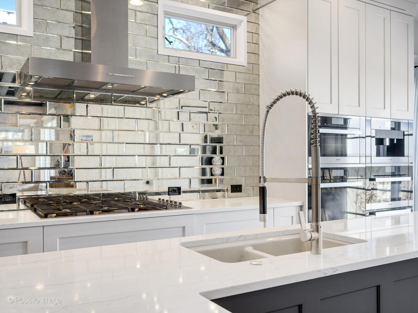 425 South Quincy Street Hinsdale, IL 60521 - Photo 12 of 53 a kitchen with a sink and cabinets