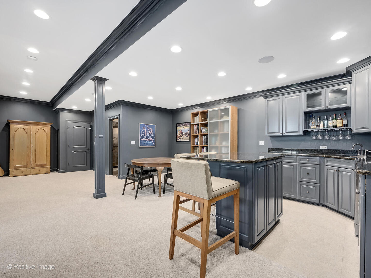 425 South Quincy Street Hinsdale, IL 60521 - Photo 31 of 53 a kitchen with stainless steel appliances granite countertop a refrigerator a sink dishwasher a dining table and chairs with wooden floor