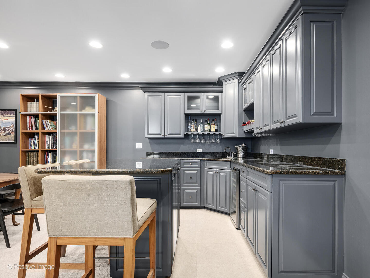 425 South Quincy Street Hinsdale, IL 60521 - Photo 32 of 53 a kitchen with granite countertop wooden cabinets and stainless steel appliances