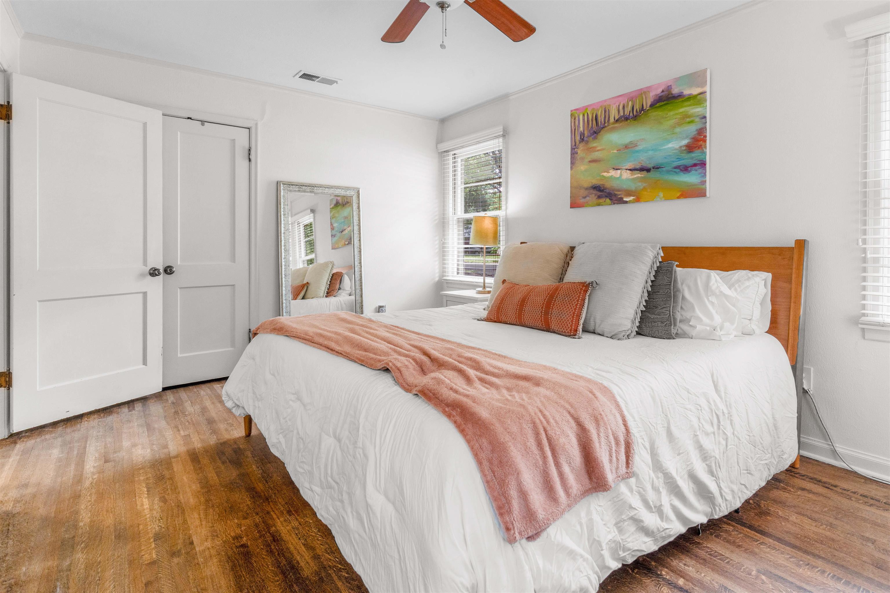 4564 Verne Road Memphis, TN 38117 - Photo 12 of 25 Bedroom featuring wood-finish flooring, white walls, and a ceiling fan