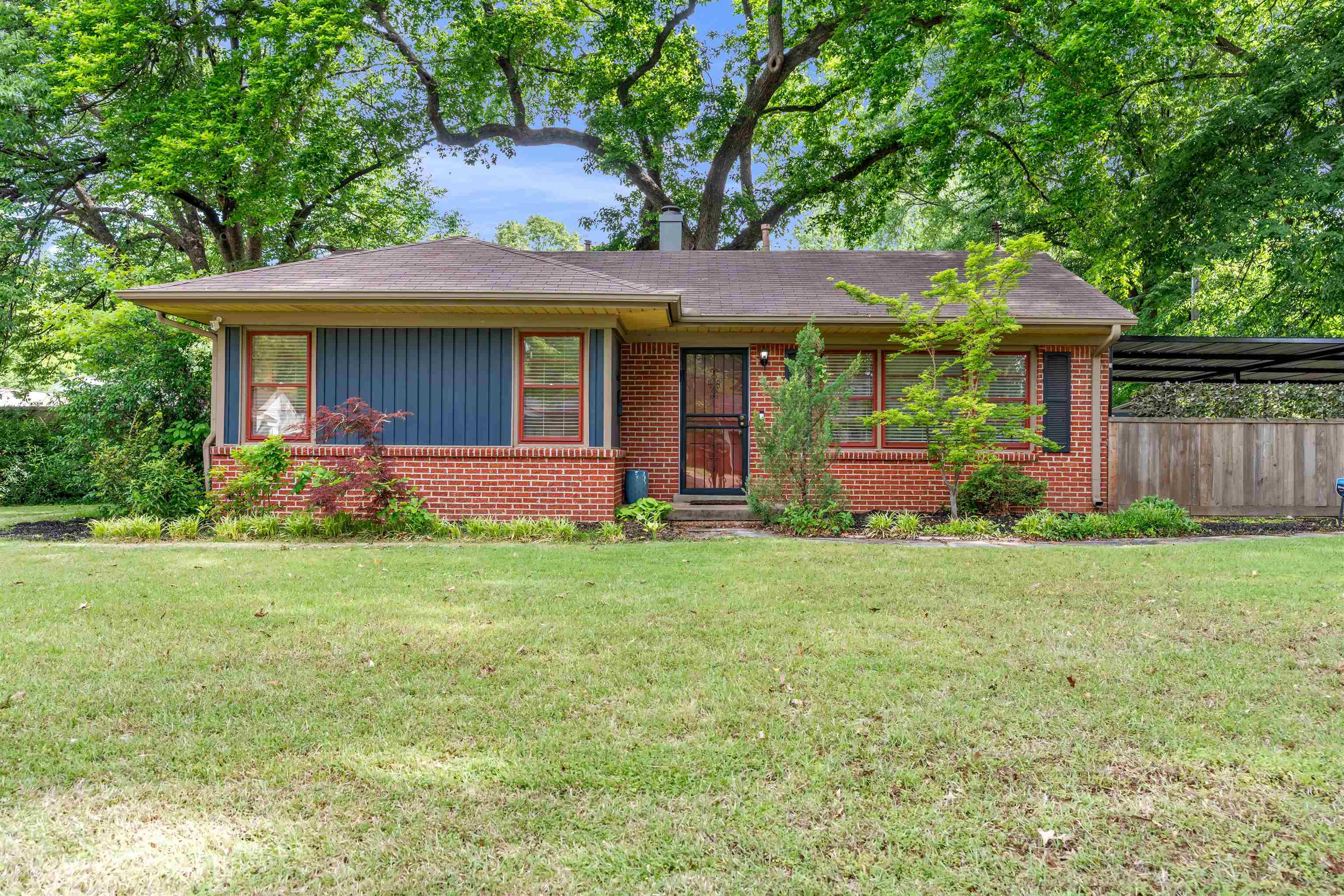 4564 Verne Road Memphis, TN 38117 - Photo 2 of 25 Brick facade home with a spacious front lawn