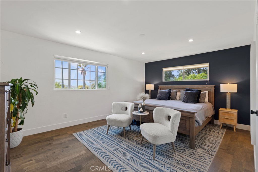 2425 Arthur Street Los Angeles, CA 90065 - Photo 13 of 29 a spacious bedroom with a bed and wooden floor