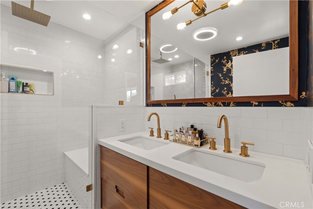 2425 Arthur Street Los Angeles, CA 90065 - Photo 15 of 29 a bathroom with a sink a large mirror and a shower