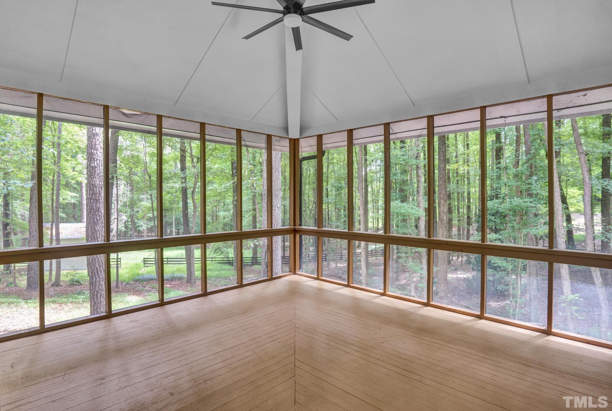 12600 Old Creedmoor Road Raleigh, NC 27613 - Photo 13 of 24 a view of an empty room with a large window