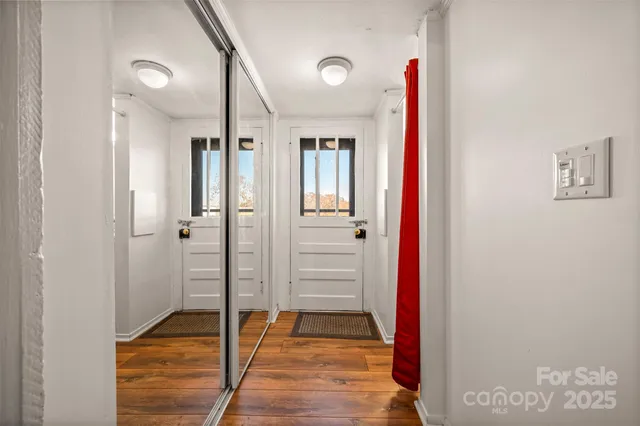 a bathroom with a tub and shower