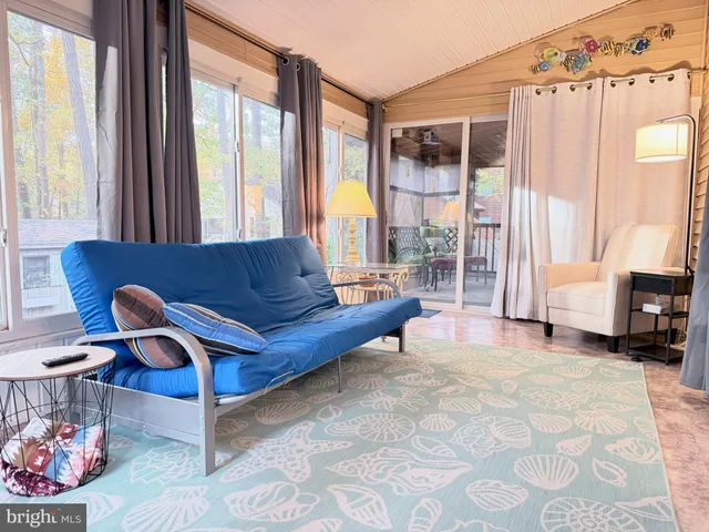 a bedroom with a bed and furniture