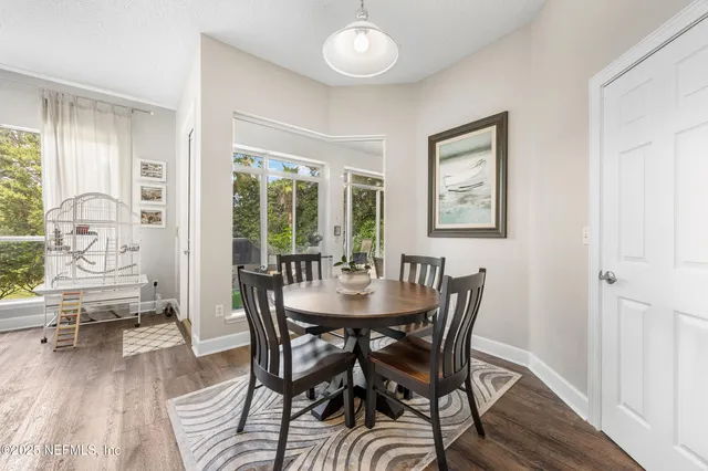a kitchen with a sink stove and refrigerator