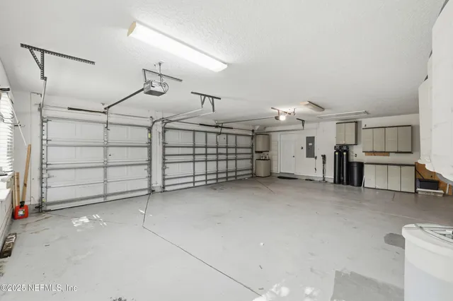 a view of a swimming pool with a lounge chairs