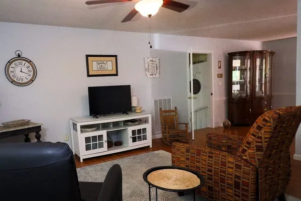 a bathroom with a sink and a shower curtain