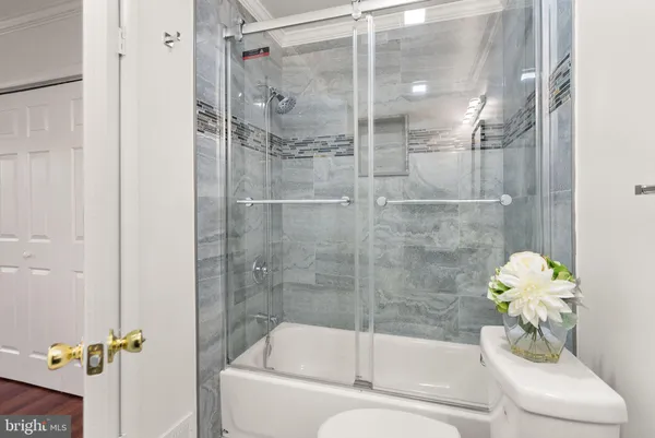 a stove top oven sitting inside of a kitchen