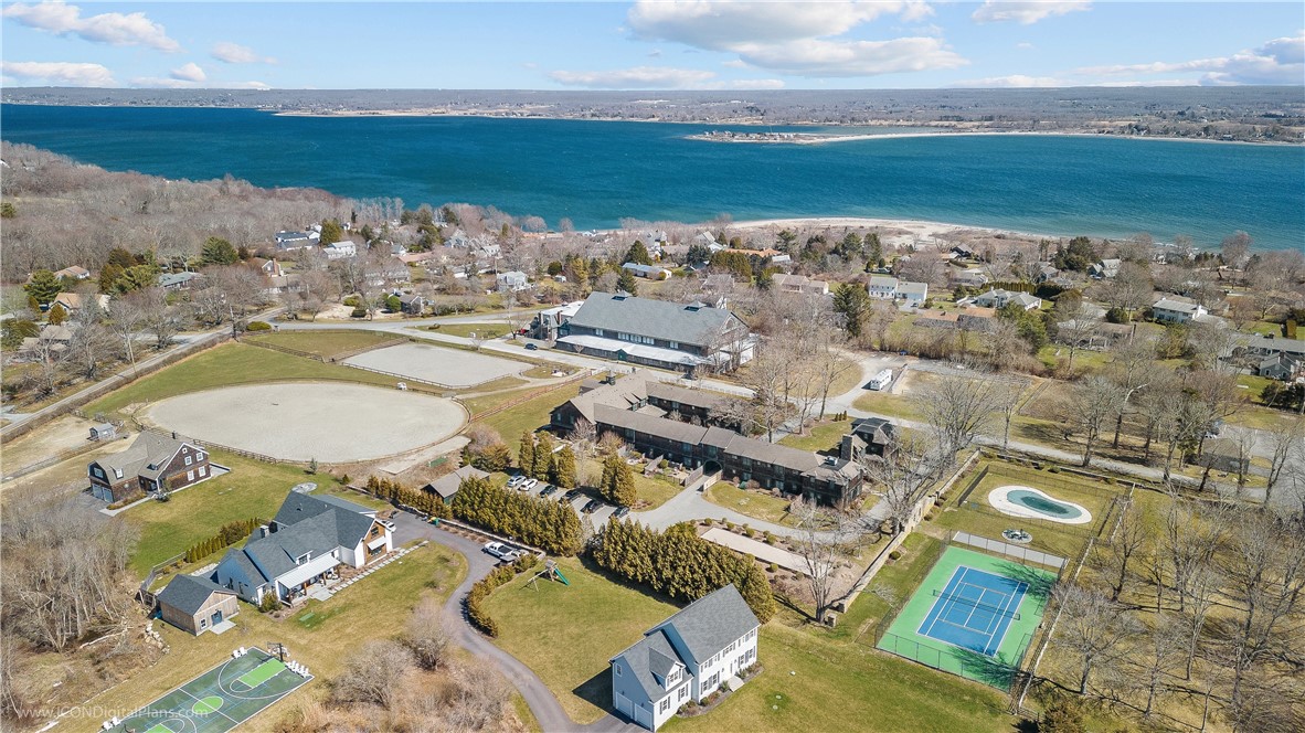 53 Sandy Point Farm Road, Unit 3 Portsmouth, RI 02871 - Photo 34 of 37 Aerial veiw of famed Vanderbilt equesterian facilities, Sandy Point beach and Vanderbilt Stables condominium pool and tennis court.