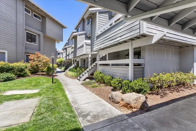a view of a back yard of a house