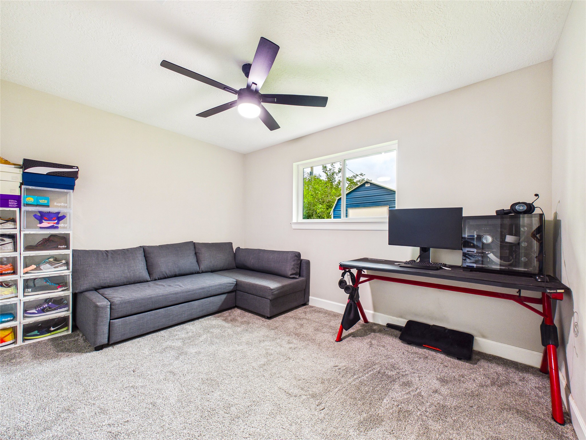10306 Rustic Rock Road La Porte, TX 77571 - Photo 23 of 38 a living room with a couch and a window