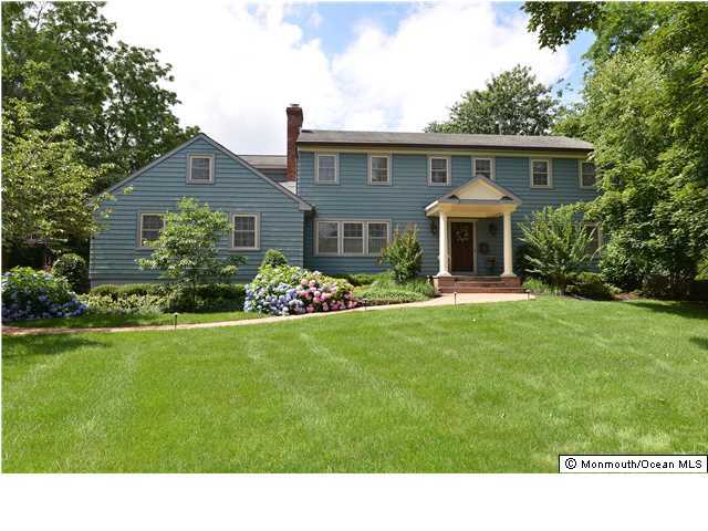 18 Rustic Terrace Little Silver, NJ 07739 - Photo 1 of 3 a front view of house with yard and green space