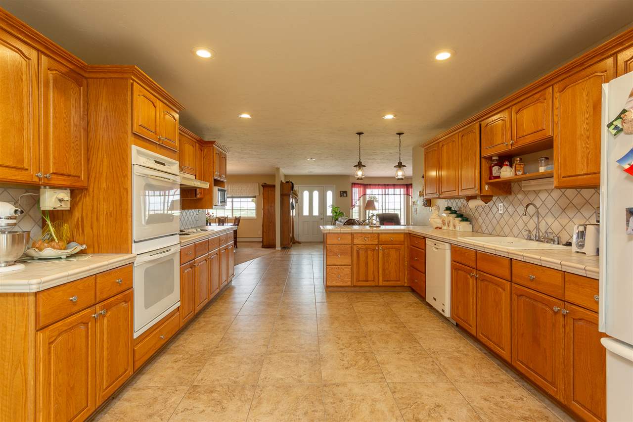 1640 12 Road Loma, CO 81524 - Photo 3 of 36 a large kitchen with stainless steel appliances lots of counter top space