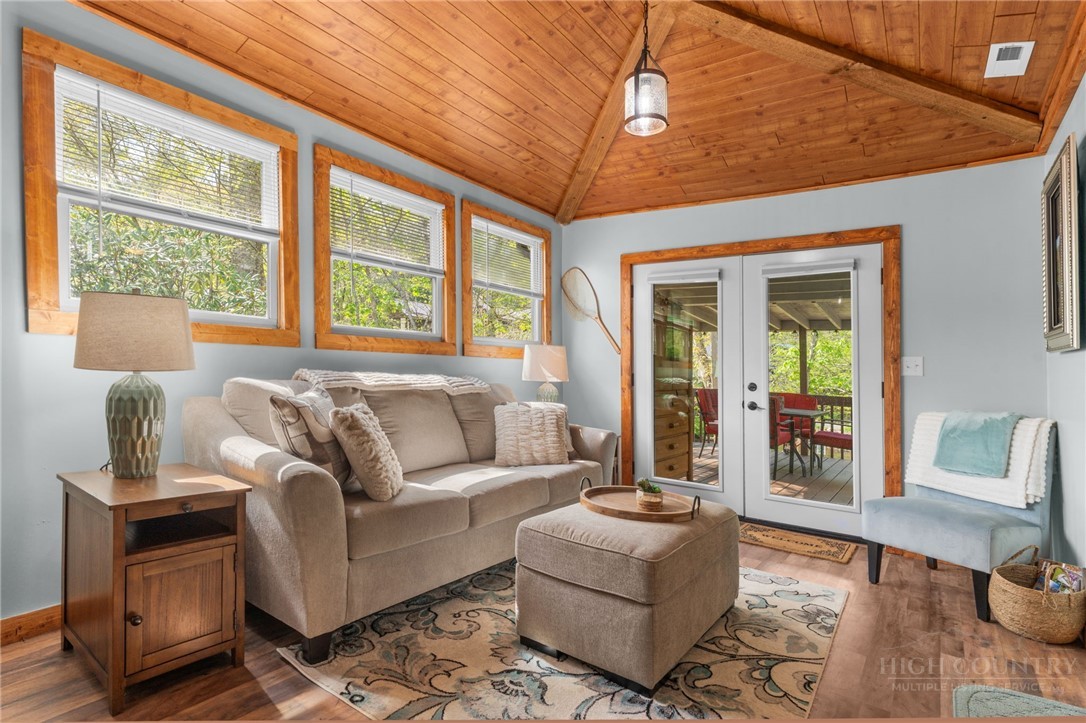 139 Golden Rod Loop Newland, NC 28657 - Photo 8 of 39 a living room with furniture and a window