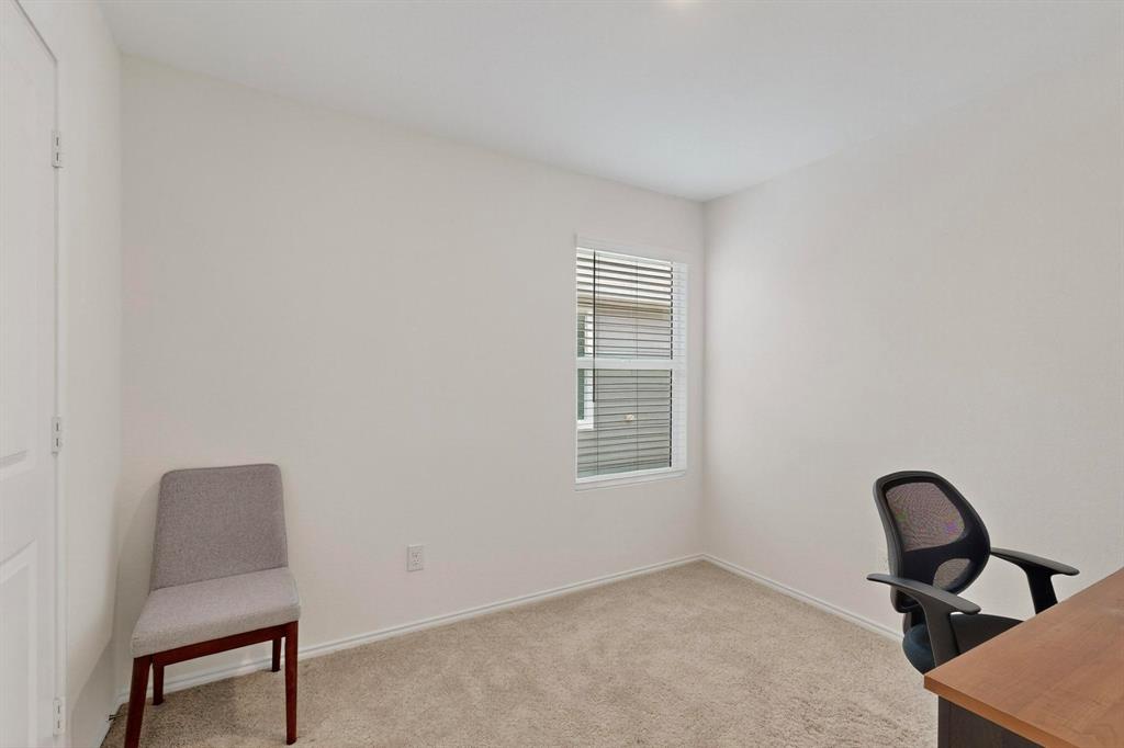 154 Herman Lane Princeton, TX 75407 - Photo 22 of 37 a view of a livingroom with chairs and a window in a room