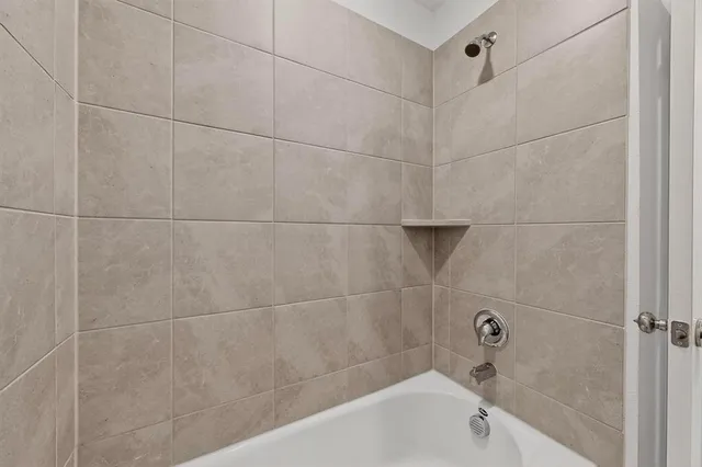 a bathroom with a bathtub