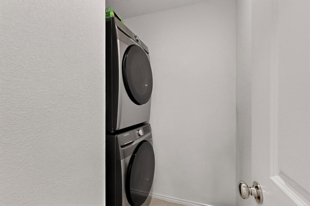 154 Herman Lane Princeton, TX 75407 - Photo 28 of 37 a close up view of a washer and dryer