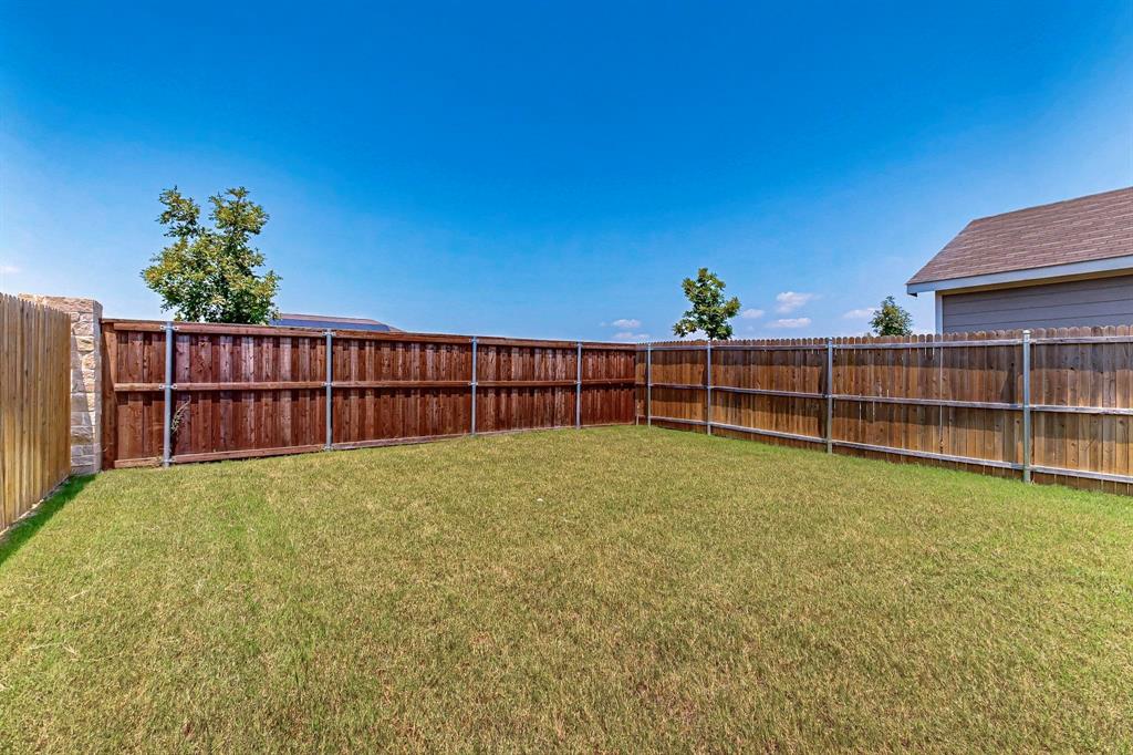 154 Herman Lane Princeton, TX 75407 - Photo 32 of 37 a view of a backyard