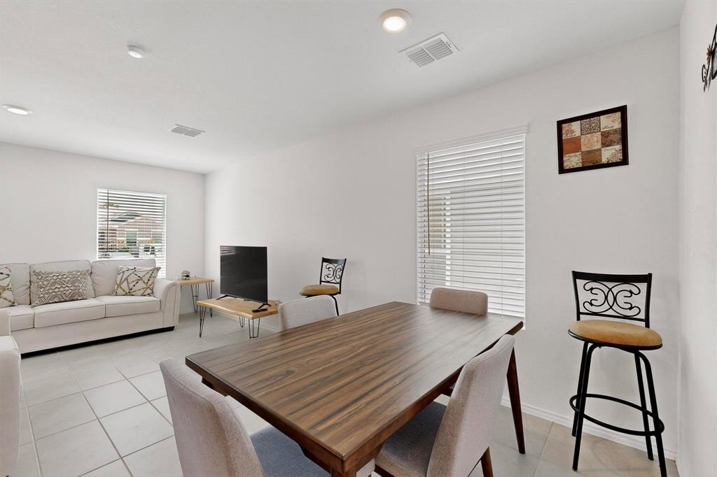 154 Herman Lane Princeton, TX 75407 - Photo 7 of 37 a view of a livingroom with furniture and window